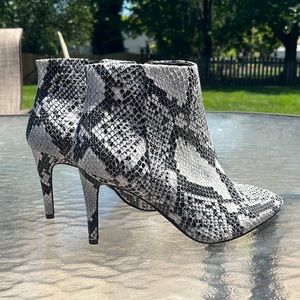 Snake skin heeled booties